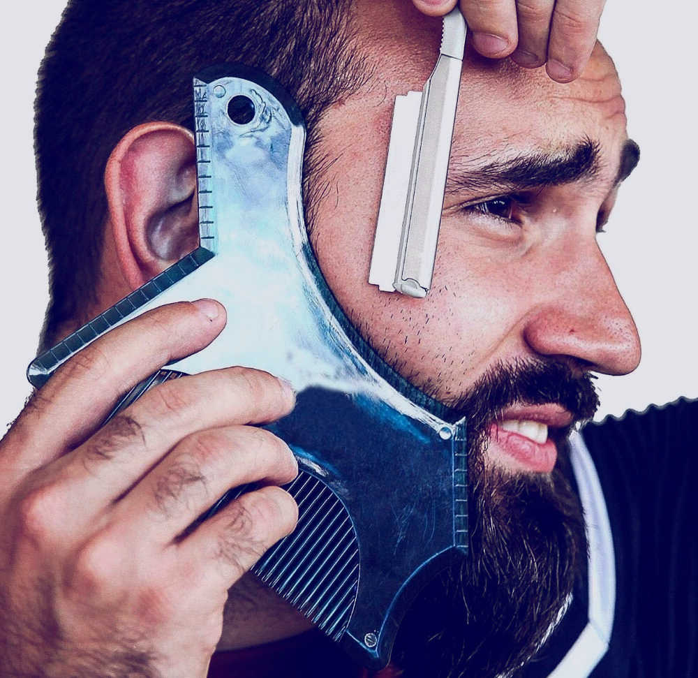 7 reglas para la barba que todos los hombres deberían seguir 5 Persona utilizando guía para la barba